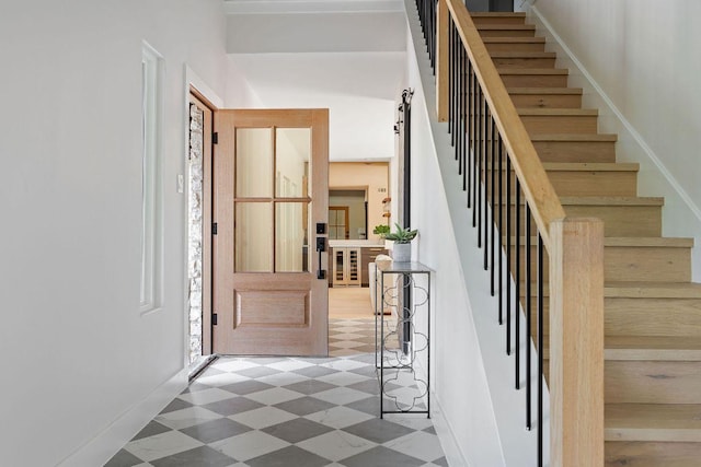 7302 Jester Blvd, Austin, TX 78750 - entrance foyer featuring tile patterned floors, stairway, and baseboards