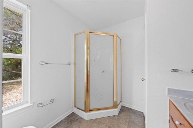 8281 Mountain Dr, Salado, TX 76571 - bathroom with a shower stall, vanity, and baseboards