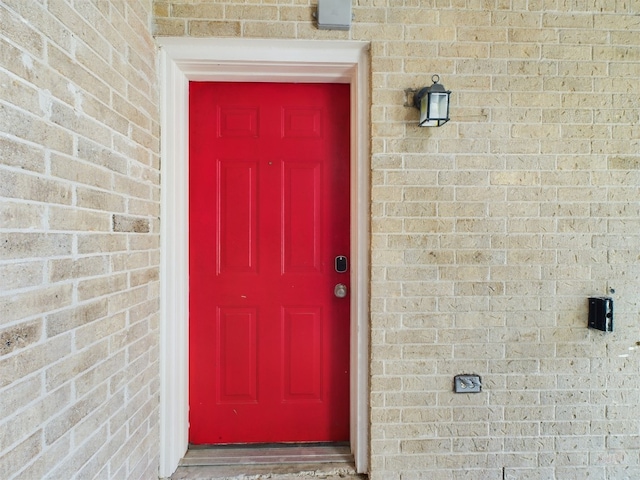 2104 Cullen Ave Unit 117, Austin, TX 78757 - property entrance featuring brick siding