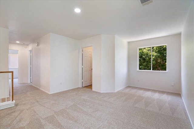 1025 Doras Dr, Pflugerville, TX 78660 - empty room with light carpet and recessed lighting