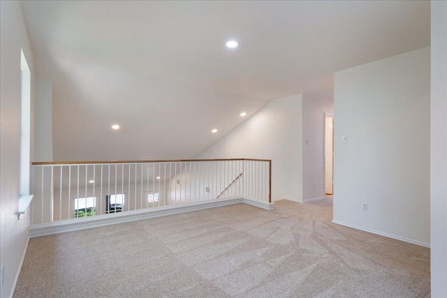 1025 Doras Dr, Pflugerville, TX 78660 - unfurnished room featuring light colored carpet, recessed lighting, and lofted ceiling
