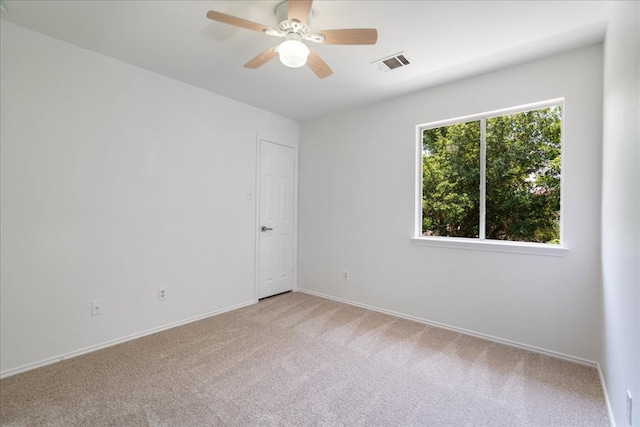 1025 Doras Dr, Pflugerville, TX 78660 - empty room with light carpet and ceiling fan