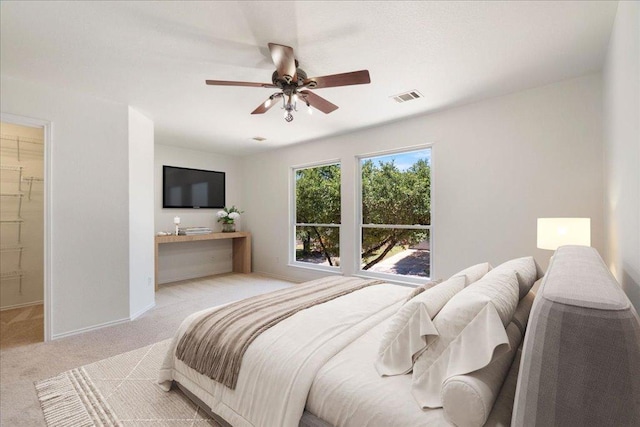 1025 Doras Dr, Pflugerville, TX 78660 - bedroom featuring light carpet and a ceiling fan