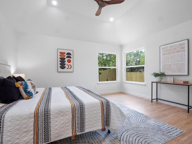 2401 Lendall Ln, Austin, TX 78744 - bedroom featuring wood finished floors, lofted ceiling, baseboards, recessed lighting, and a ceiling fan