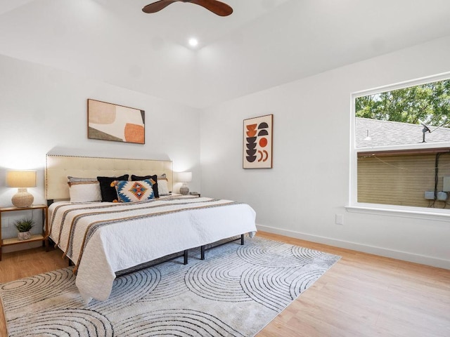 2401 Lendall Ln, Austin, TX 78744 - bedroom featuring wood finished floors, baseboards, and a ceiling fan