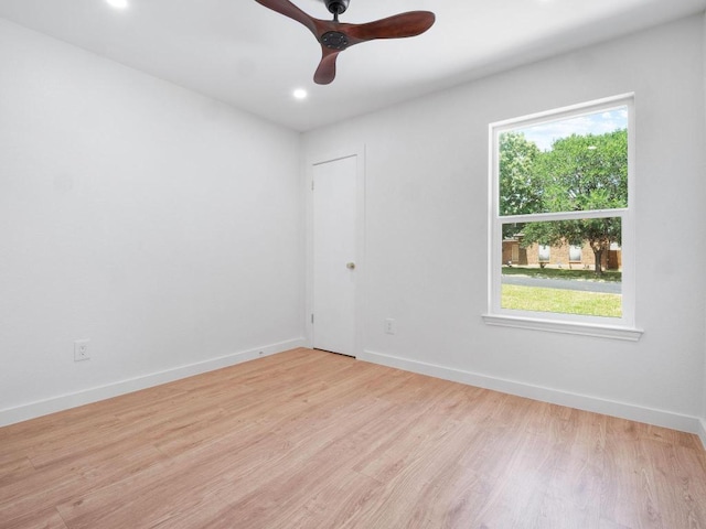 2401 Lendall Ln, Austin, TX 78744 - unfurnished room featuring healthy amount of natural light, light wood-type flooring, recessed lighting, and baseboards