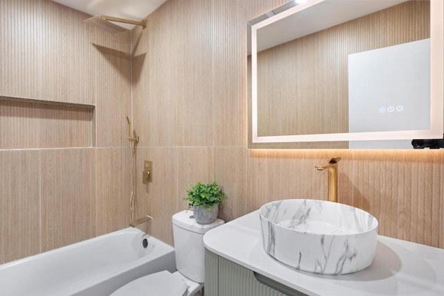 2401 Lendall Ln, Austin, TX 78744 - bathroom featuring toilet, bathing tub / shower combination, and vanity