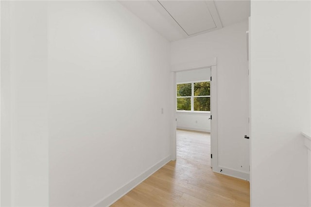 3321 Hemlock Ave Unit 2, Austin, TX 78722 - hall featuring light wood-type flooring, baseboards, and attic access