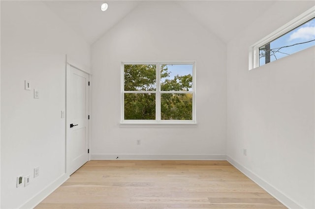 3321 Hemlock Ave Unit 2, Austin, TX 78722 - unfurnished room featuring light wood-style floors and lofted ceiling