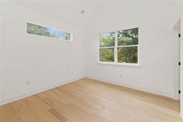 3321 Hemlock Ave Unit 2, Austin, TX 78722 - unfurnished room with healthy amount of natural light, light wood-type flooring, and high vaulted ceiling