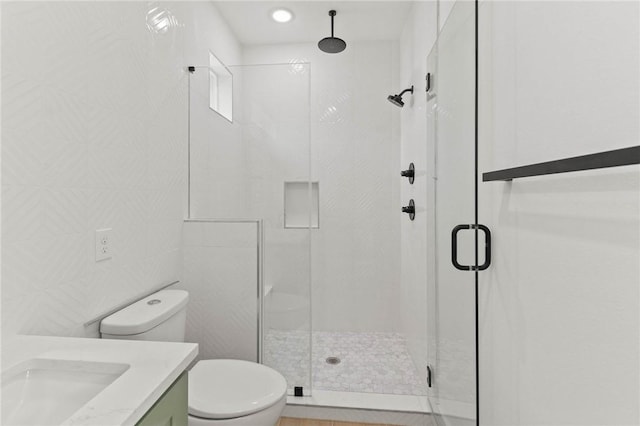3321 Hemlock Ave Unit 2, Austin, TX 78722 - bathroom with a shower stall, vanity, and tile walls
