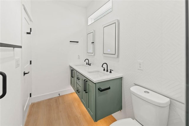 3321 Hemlock Ave Unit 2, Austin, TX 78722 - bathroom with wood finished floors and double vanity