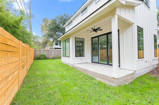 3321 Hemlock Ave Unit 2, Austin, TX 78722 - rear view of property with board and batten siding, a fenced backyard, a patio area, and ceiling fan