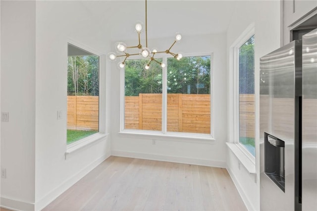 3321 Hemlock Ave Unit 2, Austin, TX 78722 - unfurnished sunroom with a chandelier