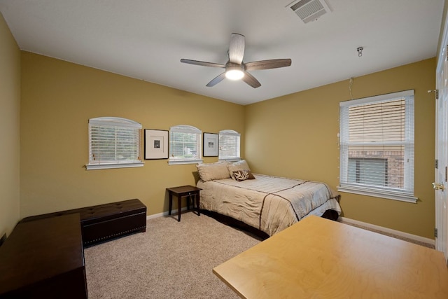 13129 Halsell Dr, Austin, TX 78732 - carpeted bedroom with baseboards and a ceiling fan