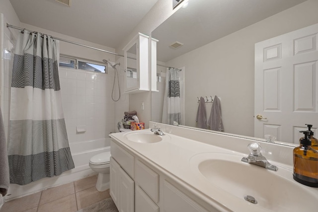 13129 Halsell Dr, Austin, TX 78732 - bathroom featuring shower / bath combo with shower curtain, double vanity, tile patterned flooring, and toilet