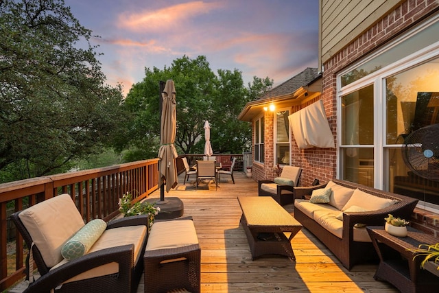 13129 Halsell Dr, Austin, TX 78732 - deck at dusk featuring outdoor lounge area and outdoor dining space