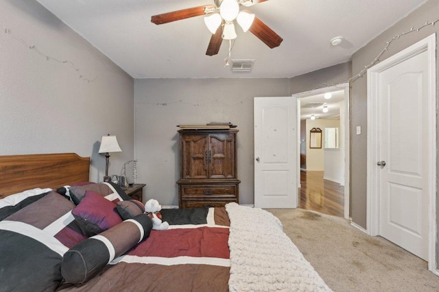 3822 Sky Ln, Round Rock, TX 78681 - bedroom featuring light colored carpet and ceiling fan