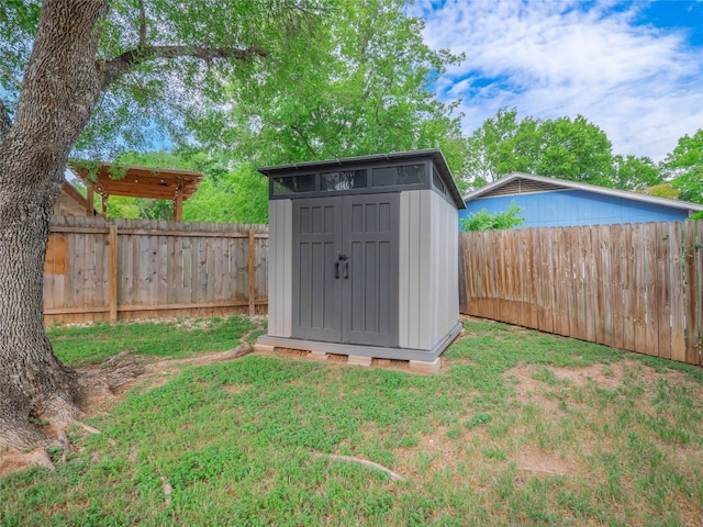 8100 Beaconcrest Dr, Austin, TX 78748 - view of shed featuring a fenced backyard