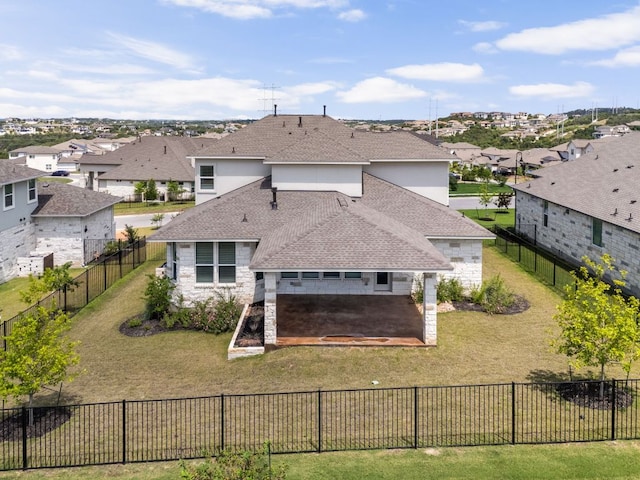 904 Arundel Rd, Lakeway, TX 78738 - rear view of house featuring a shingled roof, a residential view, stone siding, a patio, and stucco siding