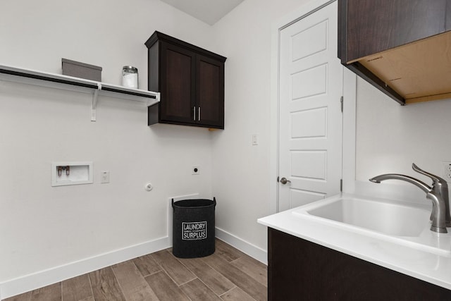 904 Arundel Rd, Lakeway, TX 78738 - washroom with cabinet space, electric dryer hookup, wood finished floors, baseboards, and washer hookup