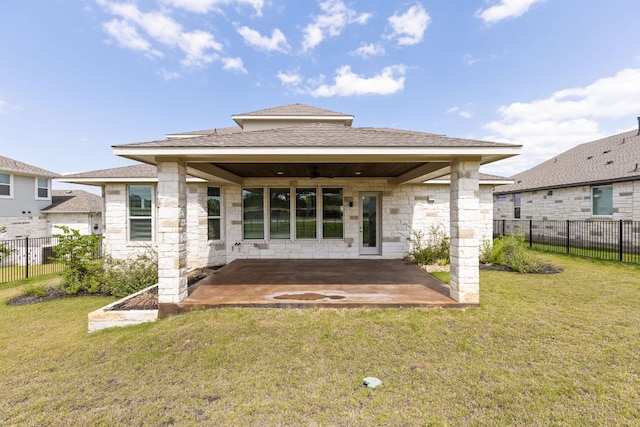 904 Arundel Rd, Lakeway, TX 78738 - back of property with a patio area, a ceiling fan, stone siding, and a shingled roof