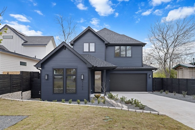 4303 Hank Ave, Austin, TX 78745 - view of front of property featuring concrete driveway, a shingled roof, and an attached garage