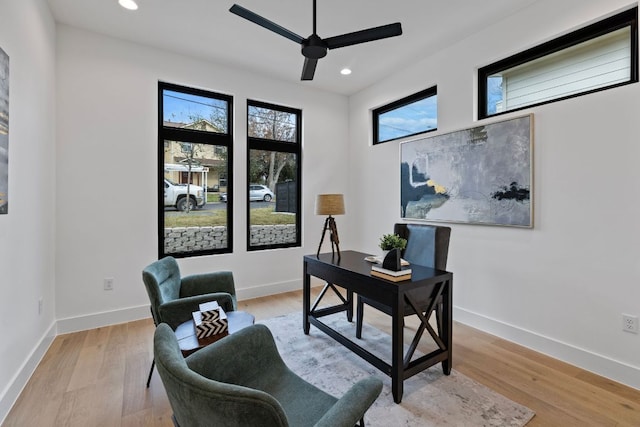 4303 Hank Ave, Austin, TX 78745 - home office with a ceiling fan, recessed lighting, and light wood-type flooring