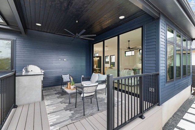 4303 Hank Ave, Austin, TX 78745 - wooden terrace featuring a ceiling fan and an outdoor hangout area