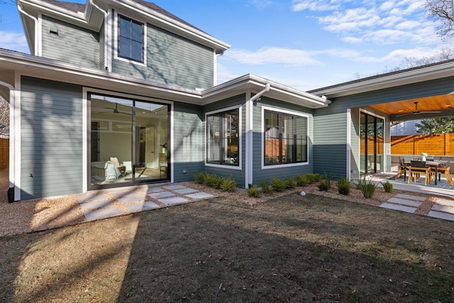 1207 Aggie Ln, Austin, TX 78757 - back of property with a patio area
