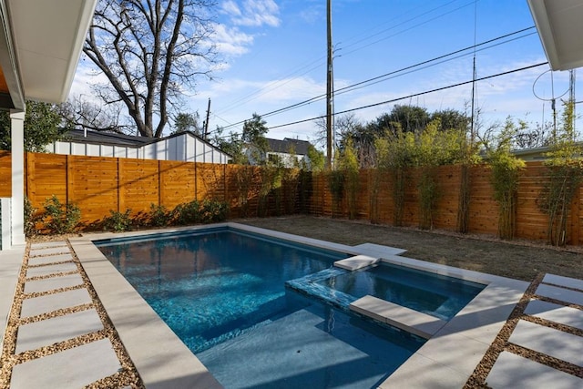 1207 Aggie Ln, Austin, TX 78757 - view of swimming pool with a pool with connected hot tub and a fenced backyard