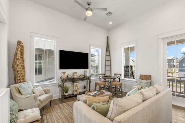 214 Sunset Ave Unit 5, Port Aransas, TX 78373 - living room with wood finished floors, ceiling fan, baseboards, and recessed lighting
