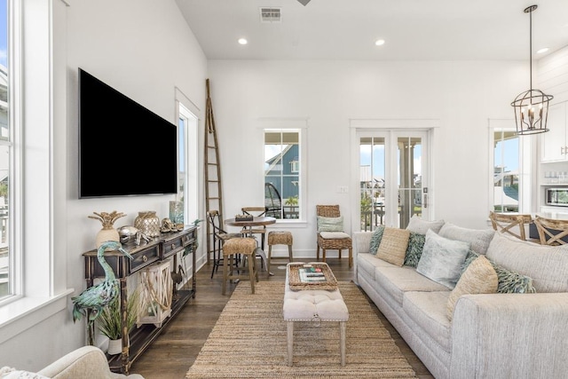 214 Sunset Ave Unit 5, Port Aransas, TX 78373 - living area with dark wood finished floors, recessed lighting, and a chandelier