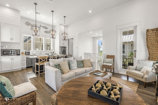 214 Sunset Ave Unit 5, Port Aransas, TX 78373 - living area featuring dark wood-style flooring and recessed lighting