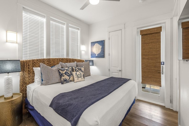 214 Sunset Ave Unit 5, Port Aransas, TX 78373 - bedroom with wood finished floors, access to outside, ceiling fan, and baseboards