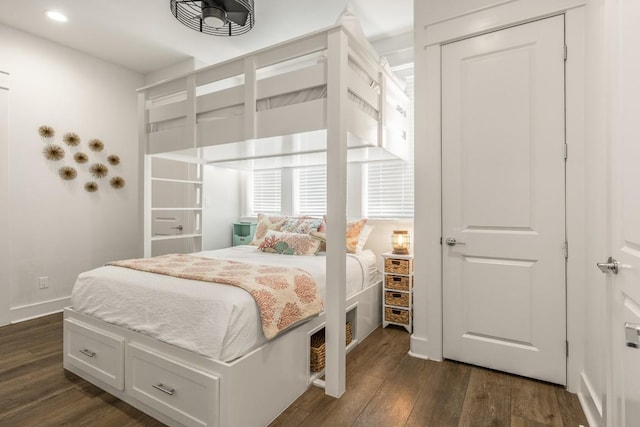 214 Sunset Ave Unit 5, Port Aransas, TX 78373 - bedroom with dark wood finished floors, recessed lighting, and baseboards
