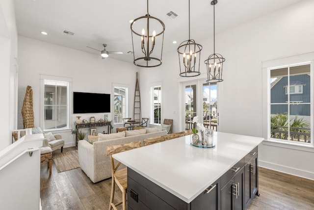 214 Sunset Ave Unit 5, Port Aransas, TX 78373 - living room with dark wood-type flooring, healthy amount of natural light, ceiling fan, and recessed lighting