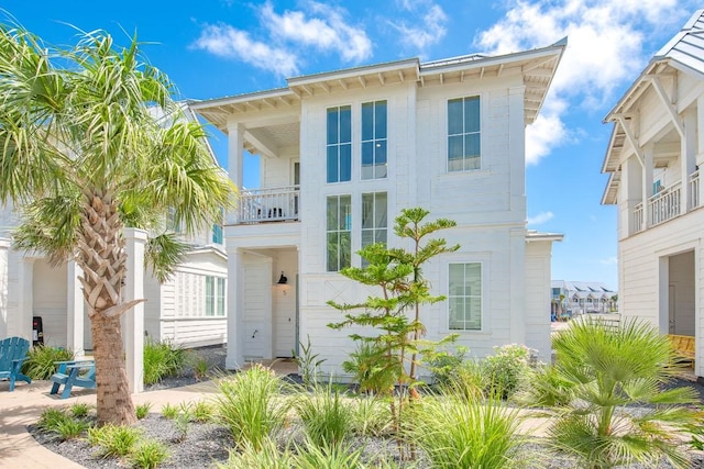 214 Sunset Ave Unit 5, Port Aransas, TX 78373 - view of front of home featuring a balcony