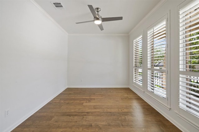14408 Broadwinged Hawk Dr, Austin, TX 78738 - spare room featuring crown molding, wood finished floors, ceiling fan, and baseboards