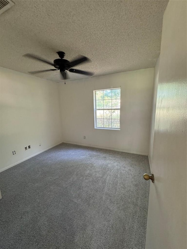 405 Lynch St, Smithville, TX 78957 - carpeted spare room featuring ceiling fan and a textured ceiling