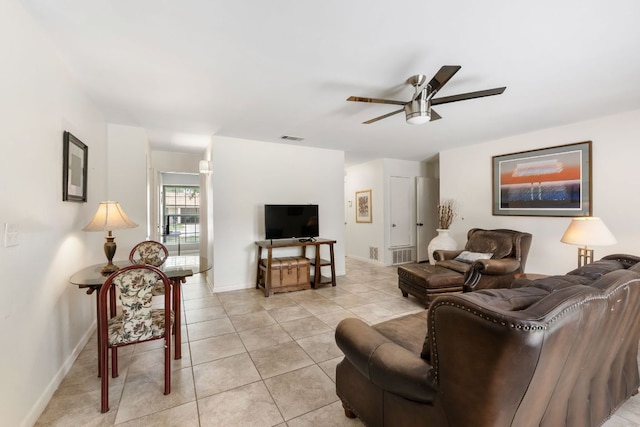 2006 Heathwood Cir, Round Rock, TX 78664 - living room with ceiling fan, light tile patterned flooring, and baseboards