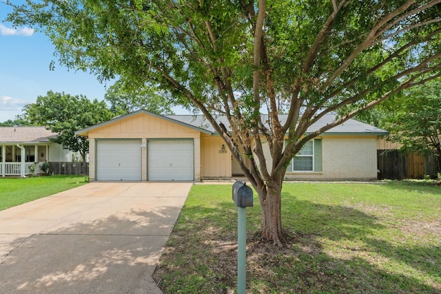 2006 Heathwood Cir, Round Rock, TX 78664 - ranch-style house featuring brick siding, driveway, and a garage