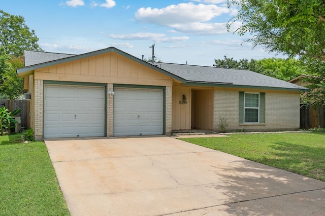 2006 Heathwood Cir, Round Rock, TX 78664 - ranch-style house with brick siding, a garage, concrete driveway, and roof with shingles