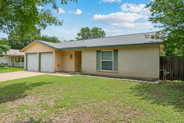 2006 Heathwood Cir, Round Rock, TX 78664 - ranch-style house featuring a garage, brick siding, and concrete driveway