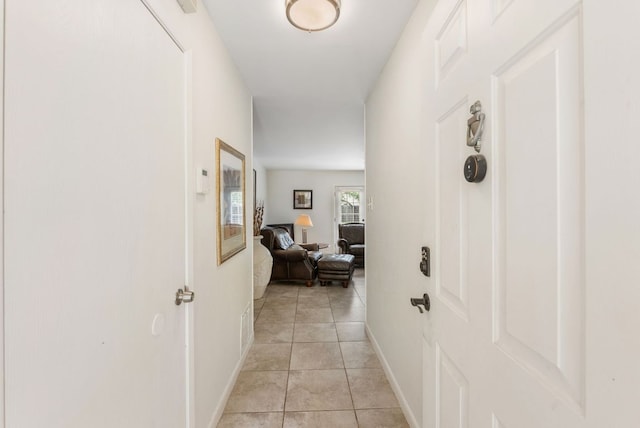 2006 Heathwood Cir, Round Rock, TX 78664 - corridor featuring baseboards and light tile patterned flooring
