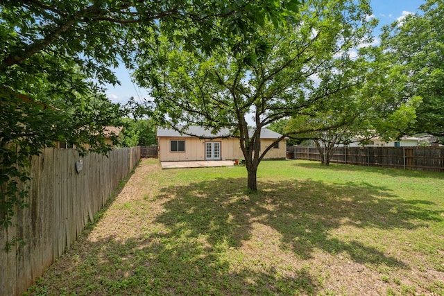 2006 Heathwood Cir, Round Rock, TX 78664 - view of yard featuring french doors and a patio area