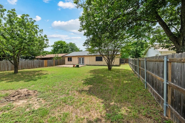 2006 Heathwood Cir, Round Rock, TX 78664 - view of yard with french doors and a patio area