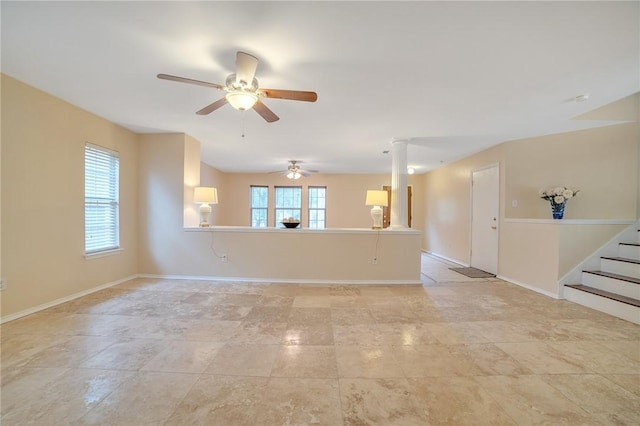 11228 Pickard Ln, Austin, TX 78748 - unfurnished living room with ceiling fan, stairway, and baseboards