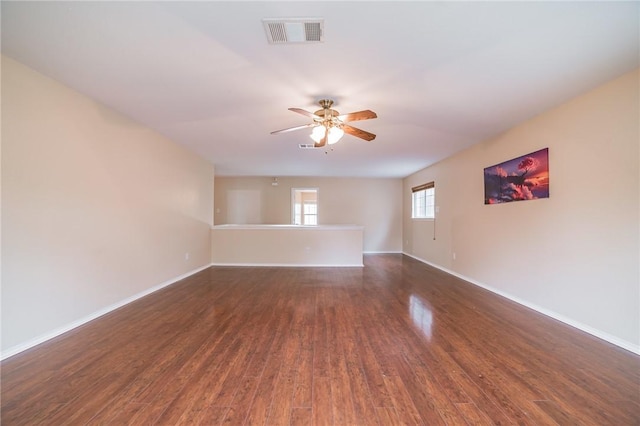 11228 Pickard Ln, Austin, TX 78748 - unfurnished room featuring ceiling fan, dark wood-type flooring, and baseboards