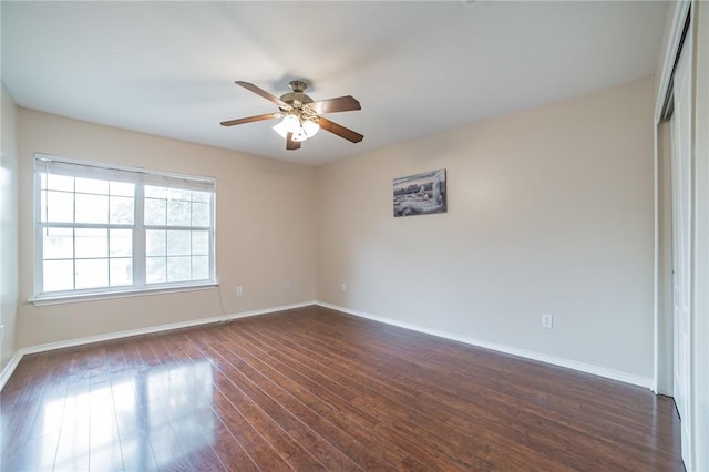 11228 Pickard Ln, Austin, TX 78748 - empty room with a ceiling fan, baseboards, and dark wood finished floors